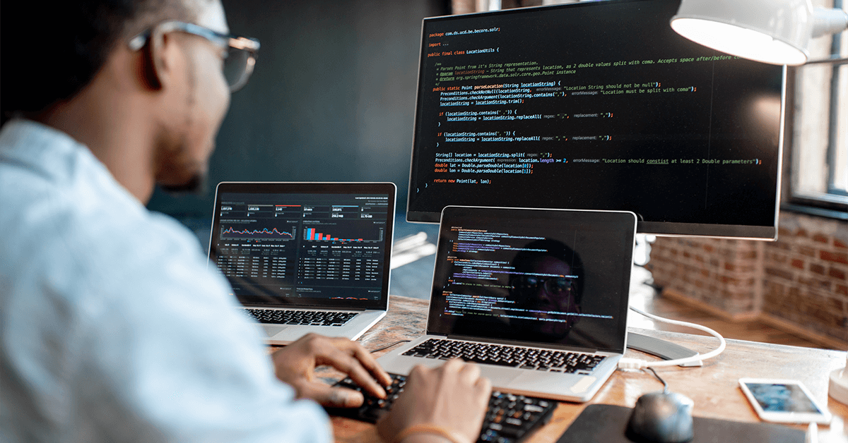 Developer coding custom software solutions